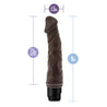 Chocolate skin tone vibrating dildo with curved head with veins along the slightly curved shaft. Twist dial on bottom to adjust intensity. Additional images show alternate angles.