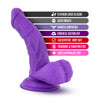 Purple realistic dildo featuring a tapered head with a pronounced lip, veins along the upwardly curved shaft, and realistic balls. Suction cup base. Additional images show alternate angles.