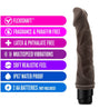 Chocolate skin tone vibrating dildo with curved head with veins along the slightly curved shaft. Twist dial on bottom to adjust intensity. Additional images show alternate angles.