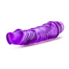 Translucent purple vibrating dildo. Pronounced curved head and subtle veins along the shaft. Twist dial on bottom to adjust intensity. Additional images show alternate angles.