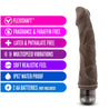 Chocolate skin tone vibrating dildo with curved head with veins along the slightly curved shaft. Twist dial on bottom to adjust intensity. Additional images show alternate angles.