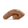 Mocha skin tone ultra realistic soft packer with subtle veins along the shaft. Skin folds along balls and shaft and realistic divot on the underside of the head.  Additional images show alternate angles.
