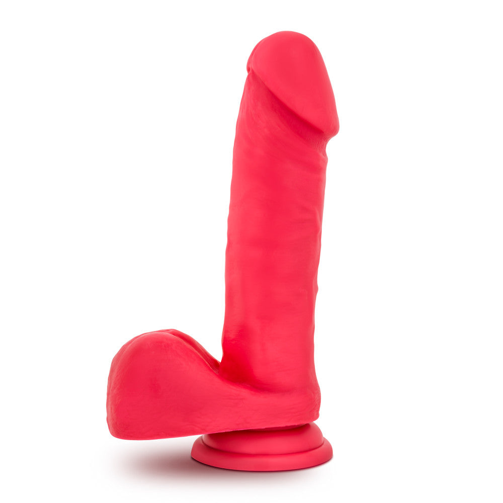 Cerise color realistic dildo. Featuring a rounded head with a pronounced lip, subtle veins along the straight shaft, and realistic balls. Suction cup base. Additional images show alternate angles.