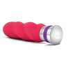petite vibrator. Straight shape with curvy spiral texture. One button operation.  Additional images show alternate angles.