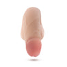 Vanilla skin tone ultra realistic soft packer with subtle veins along the shaft and a slightly tinted head. Skin folds along balls and shaft and realistic divot on the underside of the head.  Additional images show alternate angles.