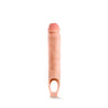 Vanilla skin tone silicone ultra realistic hollow penis extender with a strap at the base that goes around the scrotum for stability. Sheath has a veined texture and slightly pink colored head for a lifelike look.   Additional images show alternate angles.