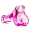 Translucent pink realistic vibrating dildo. With a subtle tapered head, curved shaft and veins and balls. Removable bullet with simple one-button operation.  Additional images show alternate angles.