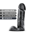 Black realistic dildo with metallic sheen. Featuring a large rounded head, veins along the straight extra thick shaft and large realistic balls. Smooth flat base. Additional images show alternate angles.