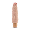 Vanilla skin tone vibrating dildo has an ultra realistic shape that offers significant girth, with a subtly defined head and veins along the shaft. Twist dial on bottom to adjust intensity. Additional images show alternate angles.