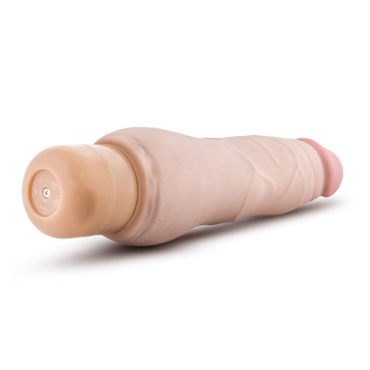 Vanilla skin tone realistic vibrating dildo. Defined pink head and subtle veins along the shaft. Twist dial on bottom to control intensity. Additional images show alternate angles.