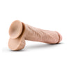 Vanilla skin tone realistic dildo. Featuring a rounded head, veins along the straight but flexible shaft, and realistic balls. Suction cup base. Additional images show alternate angles.