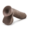Chocolate skin tone ultra realistic dildo with a tapered realistic head for easy insertion and a smooth straight but flexible shaft. Realistic balls. Suction cup base. Additional images show alternate angles.