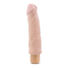 Ultra realistic, vanilla skin tone vibrating dildo with a defined head and subtle veins along the shaft. Long shaft with a very slight curve. Twist dial on bottom to adjust intensity.  Additional images show alternate angles.