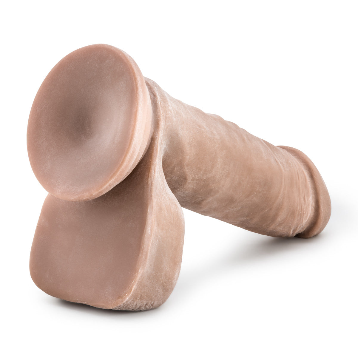 Mocha skin tone ultra realistic dildo with a realistic head, subtle veins along the straight but flexible shaft and small realistic balls. Suction cup base. Additional images show alternate angles.